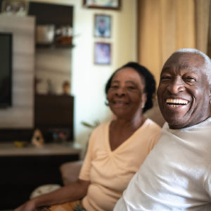 husband and wife smiling in the picture